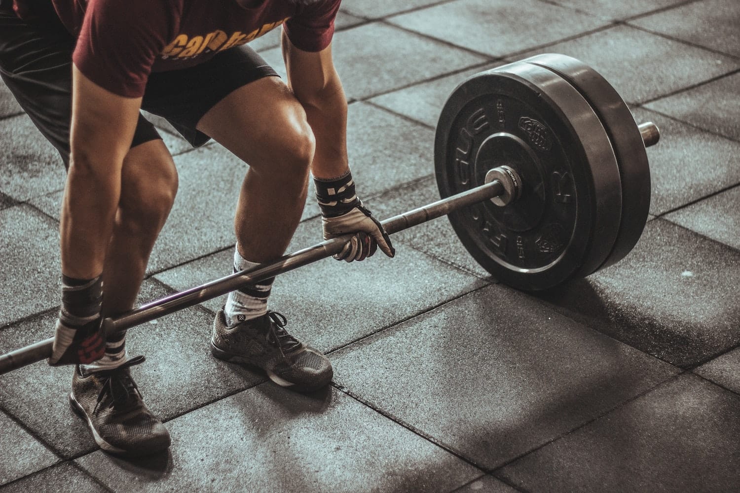 person performing a deadlift