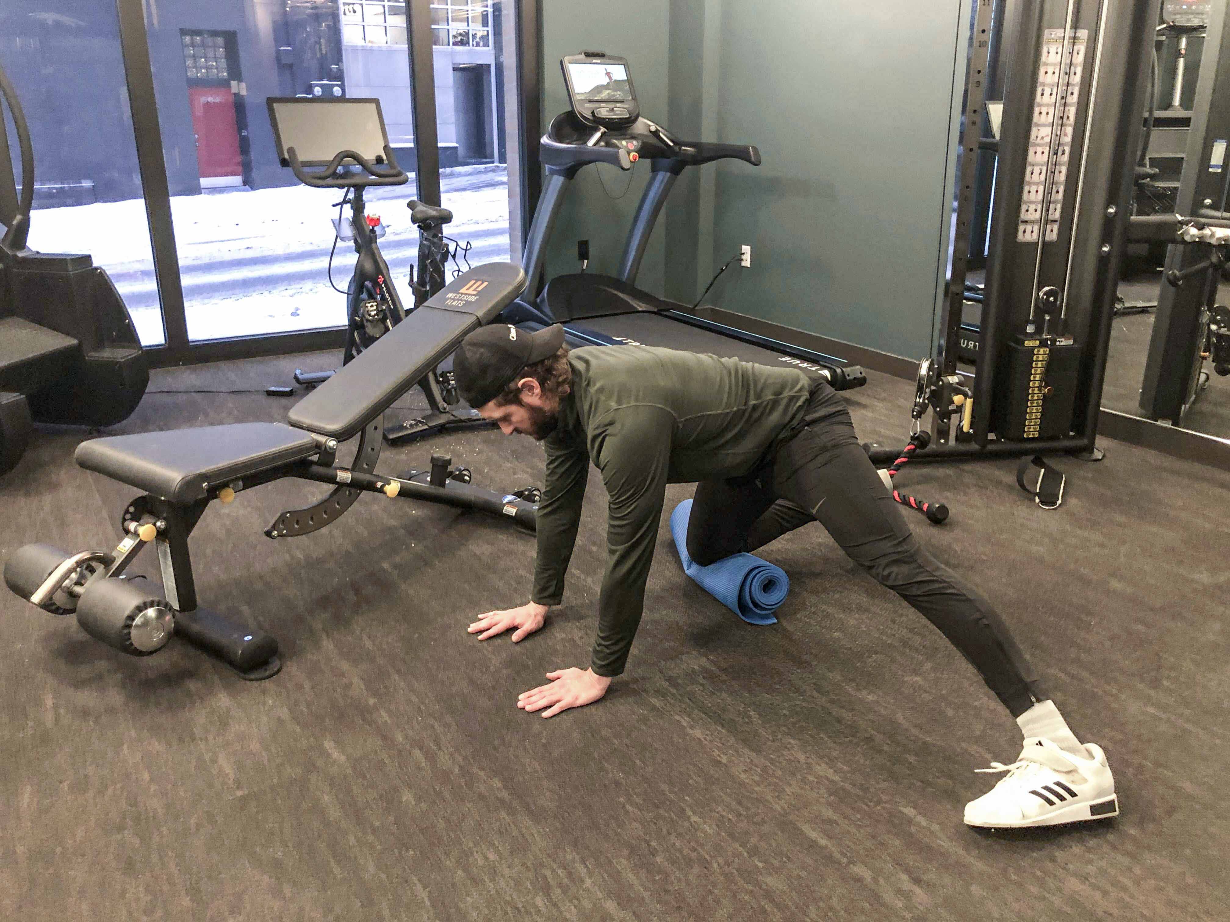 Split quadruped adductor mobilization hold